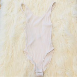 Scoop neck body suit.